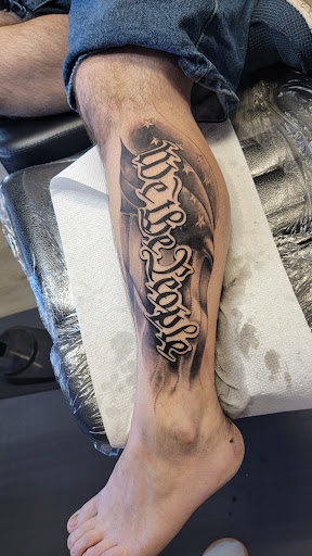 Explore fist bump tattoo ideas, creative tattoo ideas in Kalispell, available at Swindler Ink