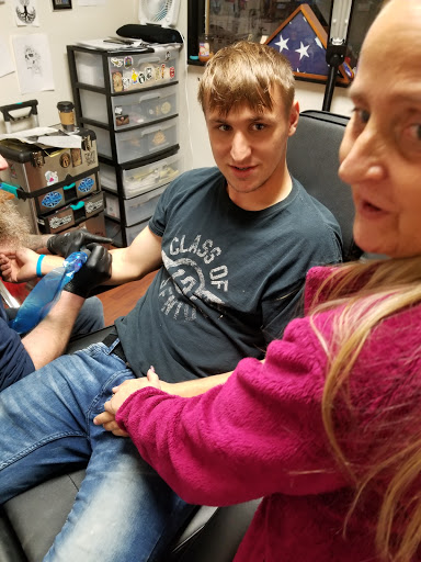 Explore trash tattoo ideas, creative tattoo ideas in Monticello, available at Its Just A Flesh Wound