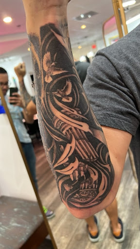 Explore spine tattoo ideas for females, creative tattoo ideas in Sarasota, available at Oddity Tattoo Art University