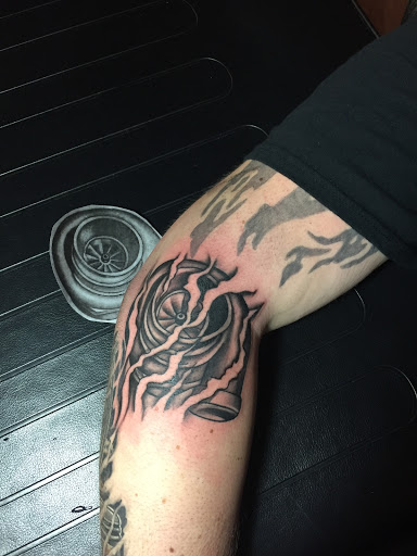 Explore filigree tattoo ideas, creative tattoo ideas in Marshfield, available at All The Above Tattoo Studio