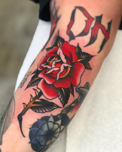 Explore vine tattoo ideas, creative tattoo ideas in Johnson City, available at Gold Cross Tattoo Co.