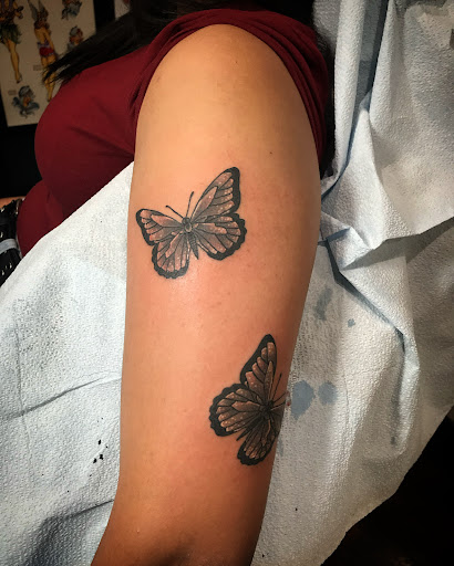 Explore ear tattoo ideas for women, creative tattoo ideas in Libertyville, available at Lucky Seven Tattoo