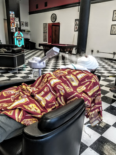 Explore sign language tattoo ideas, creative tattoo ideas in Buffalo, available at The Salty Dog Barbershop