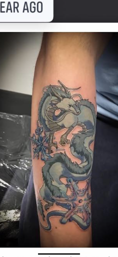 Explore snail tattoo ideas, creative tattoo ideas in Springfield, available at Anchored Ink Tattoo & Piercing by SPLAT LLC