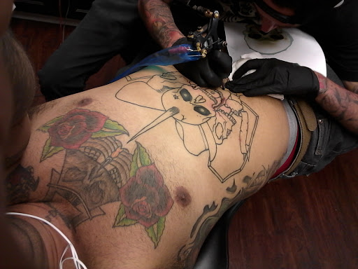 Explore upper back tattoo ideas, creative tattoo ideas in Fontana, available at Inkspot Tattoo