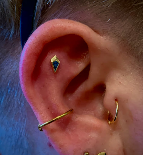 Explore middle neck tattoo ideas, creative tattoo ideas in Chapel Hill, available at Spica Body Piercing