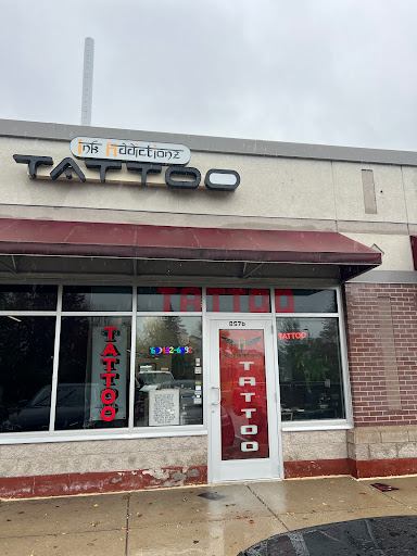 Explore christmas tree tattoo ideas, creative tattoo ideas in Minneapolis, available at Ink Addictionz Tattoo