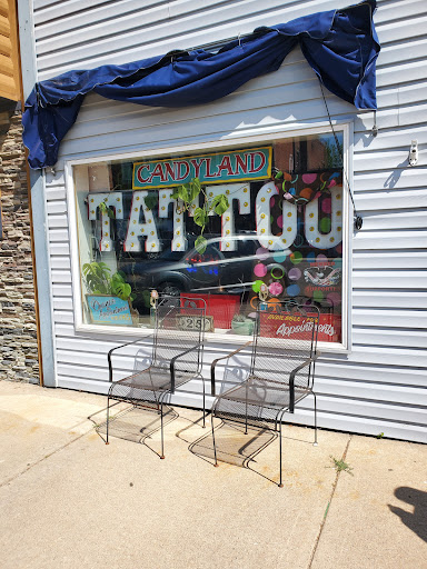 Find middle boob tattoo ideas for your next unique tattoo in Shell Lake at Candyland