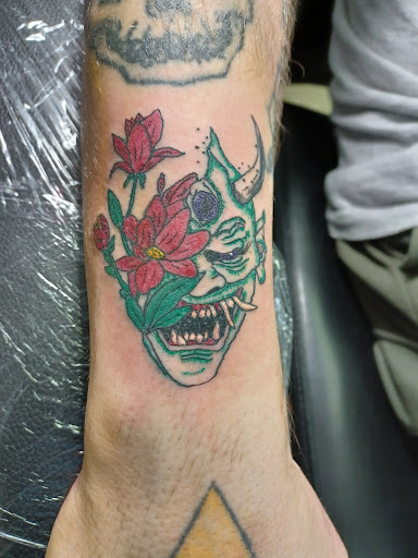 Explore tribal sleeve tattoo ideas, creative tattoo ideas in Owosso, available at Twisted ink tattoo