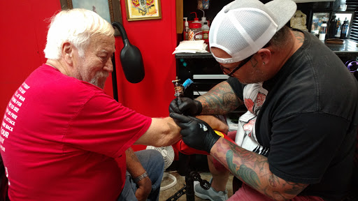 Explore book tattoo ideas, creative tattoo ideas in Saraland, available at Art Fusion Tattoo Gallery