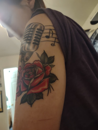 Explore cowboy boot tattoo ideas, creative tattoo ideas in Crystal Lake, available at Dark Heart Tattoo