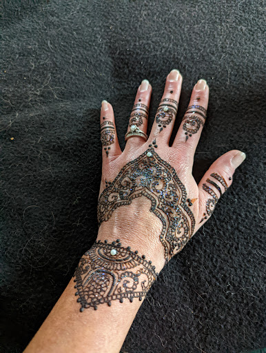 Explore dog collar tattoo ideas, creative tattoo ideas in Littleton, available at Artistic Henna Designs