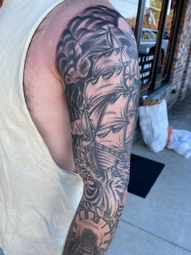 Explore men's back tattoos ideas, creative tattoo ideas in Gadsden, available at Old School Ink Electric Tattooing