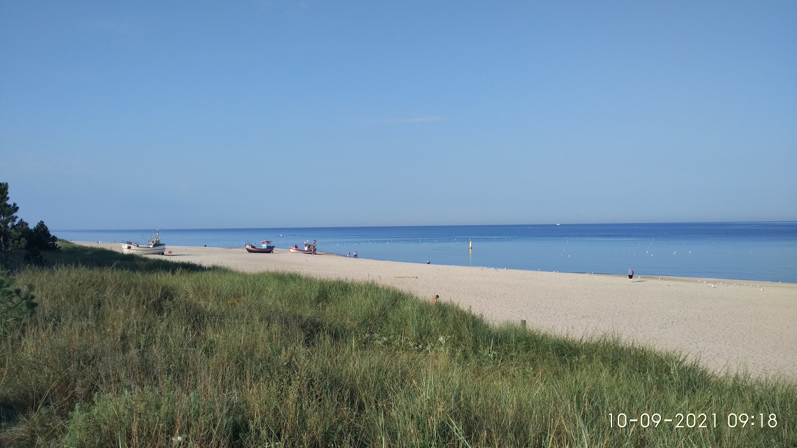 Foto av Dabki Beach II med turkos rent vatten yta