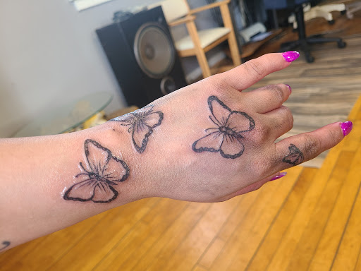 Find best friend tattoo ideas for your next unique tattoo in Rollingstone at Tiger Lily Tattoo