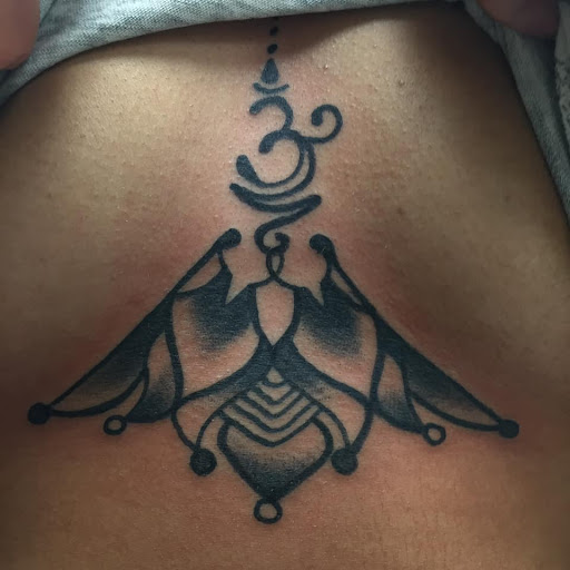 Explore behind neck tattoo ideas, creative tattoo ideas in Bristol, available at Golden Rule Tattoo