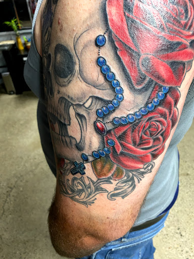 Explore gothic hand tattoo ideas, creative tattoo ideas in Reno, available at My Religion Tattoo - No Piercing