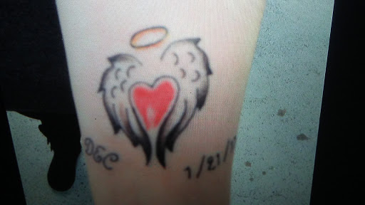 Explore abortion tattoos ideas, creative tattoo ideas in Lima, available at White Wizard Tattoo & Body Piercing