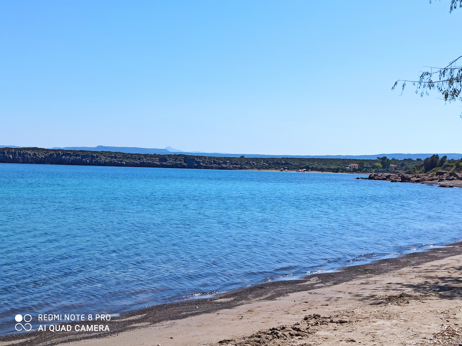 Fotografija Paralia Tokmakia II z svetel pesek površino