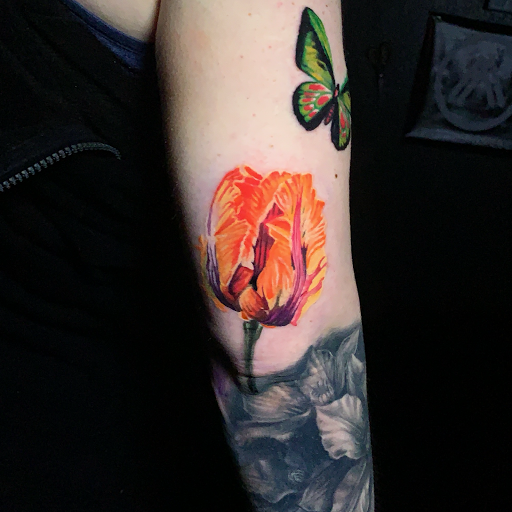 Find low back tattoo ideas for your next unique tattoo in Tacoma at Ghostline Tattoo