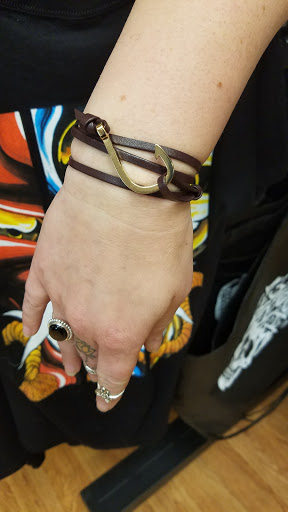 Explore spiral tattoo ideas, creative tattoo ideas in Valparaiso, available at Elysium Studios