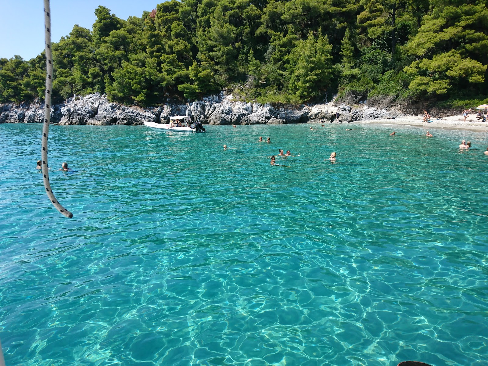 Photo of Megalo Pefko with turquoise pure water surface