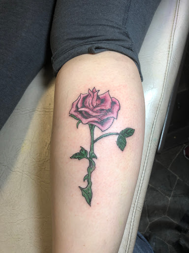 Explore hang loose tattoo ideas, creative tattoo ideas in Calumet, available at Tattooing by Big Ben