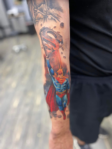 Explore bass tattoos ideas, creative tattoo ideas in El Paso, available at American Tattoo Society of Ft Bliss
