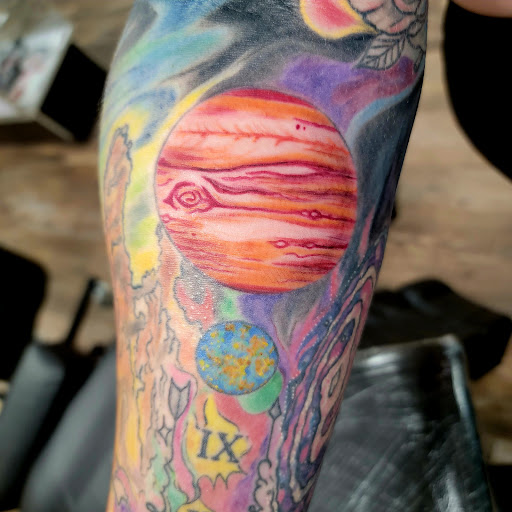 Explore globe tattoo ideas, creative tattoo ideas in Traverse City, available at Pinups & Needles