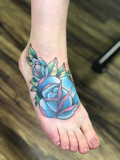 Explore skull hand tattoo ideas, creative tattoo ideas in Ocala, available at The Tattoo Gallery of Ocala LLC