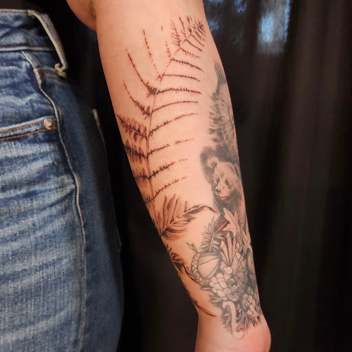 Explore mother son tattoos ideas, creative tattoo ideas in Minocqua, available at Whisky Rose Tattoo Parlor