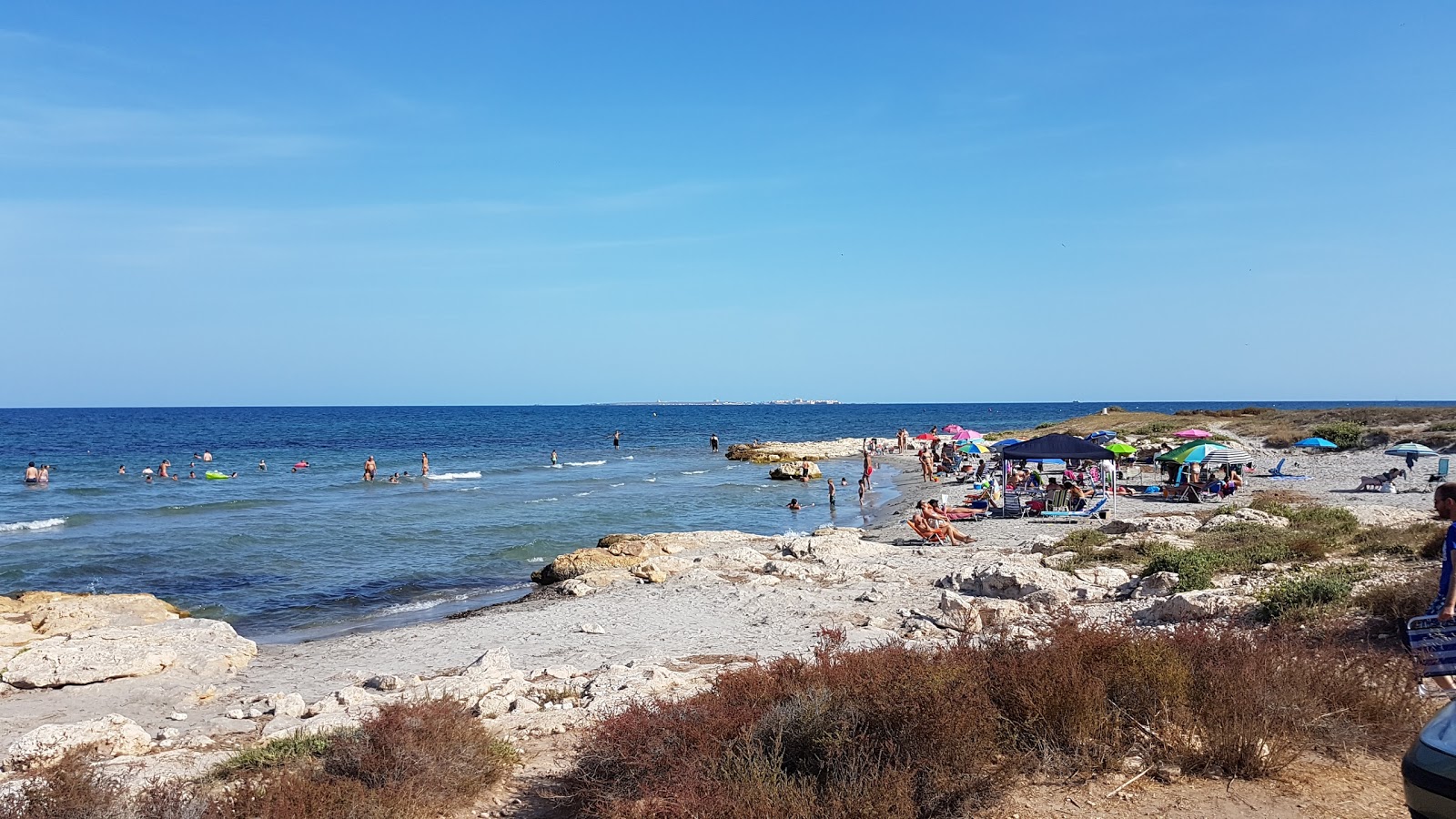 Foto av Calas del Cuartel med brunsand yta