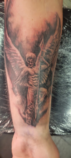 Explore sick tattoo ideas for men, creative tattoo ideas in Las Vegas, available at Work of Art Tattoo and Piercing