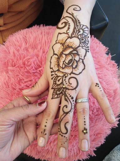 Explore rock n roll tattoo ideas, creative tattoo ideas in Littleton, available at Artistic Henna Designs