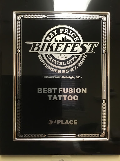 Explore ass tattoo ideas, creative tattoo ideas in Wake Forest, available at Revelation Ink Tattoo and Piercing