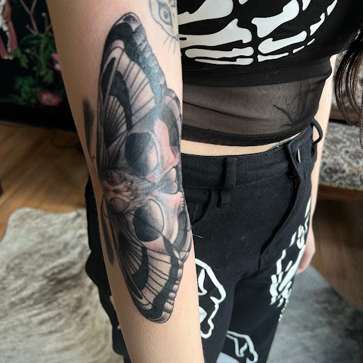 Explore tattoo ideas womens arm, creative tattoo ideas in Buffalo, available at True Gloom Tattoo Studio
