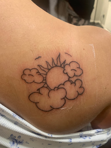 Explore daisy tattoo ideas, creative tattoo ideas in Memphis, available at Skin City Ink Memphis - Tattoo & Piercing