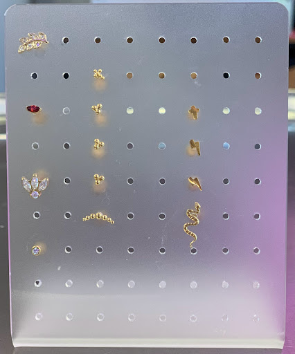 Explore tragus tattoo ideas, creative tattoo ideas in Fort Walton Beach, available at Piercings by Torrie