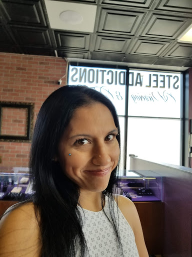 Explore cute woman tattoo ideas, creative tattoo ideas in Toledo, available at Steel Addictions