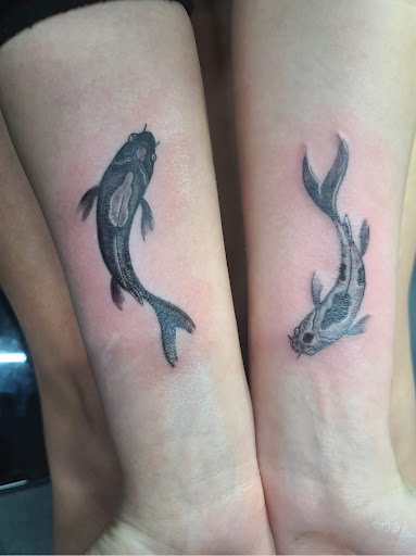 Explore neck tattoo ideas for females, creative tattoo ideas in Macomb, available at Nevermore Tattoo Gallery