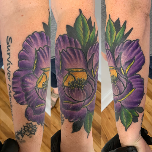 Explore women's side tattoo ideas, creative tattoo ideas in Kansas City, available at Golden Stag Tattoo and Gallery