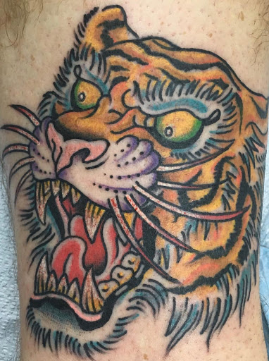 Explore dinosaur tattoo ideas for son, creative tattoo ideas in San Angelo, available at Old Town Tattoo