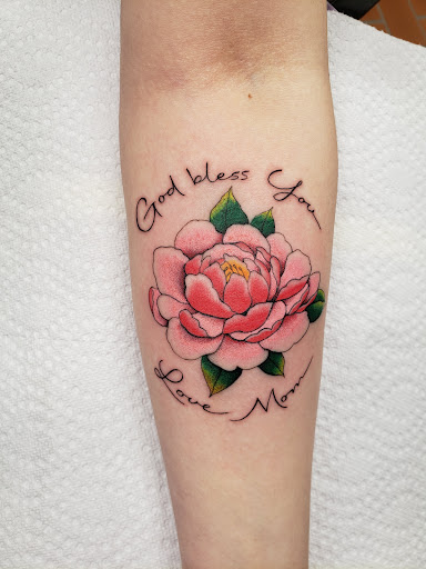 Find cat tattoo ideas small for your next unique tattoo in Peoria at Freedom Ink Tattoos