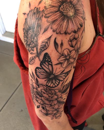Explore tattoo ideas for women sleeve, creative tattoo ideas in Kingston, available at Innovative Ink Tattoo & SMP
