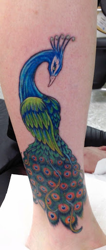 Explore thigh flower tattoo ideas, creative tattoo ideas in Syracuse, available at Reflective Design