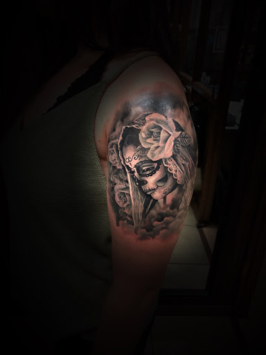 Explore cash tattoo ideas, creative tattoo ideas in Riverside, available at Elizabeth St. Tattoo