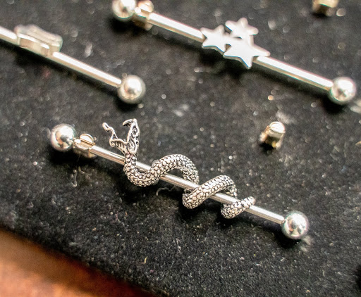 Explore tattoo ideas for the ankle, creative tattoo ideas in Summerville, available at Exotic Impressions Body Piercing