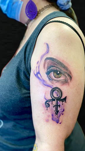 Explore tattoo cartoon ideas, creative tattoo ideas in Charlotte, available at Phoenix Ink