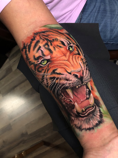 Explore tattoo ideas of my son, creative tattoo ideas in Asheboro, available at BlackHeart Tattoo