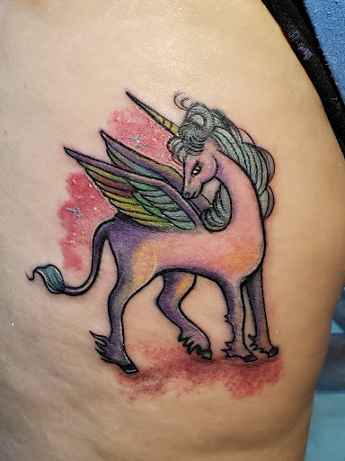 Explore purple rose tattoo ideas, creative tattoo ideas in Bakersfield, available at Monster Ink